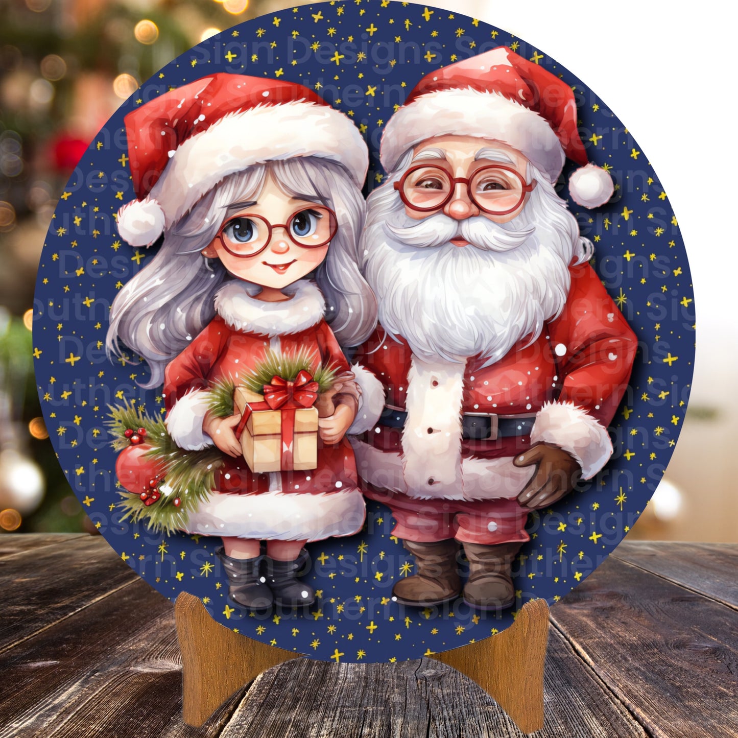 Cute Santa and Mrs Claus with Blue Background Christmas Wreath Sign