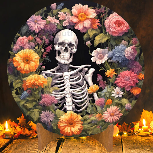 Skeleton Relaxing in a Bed of Flowers Halloween Wreath Sign